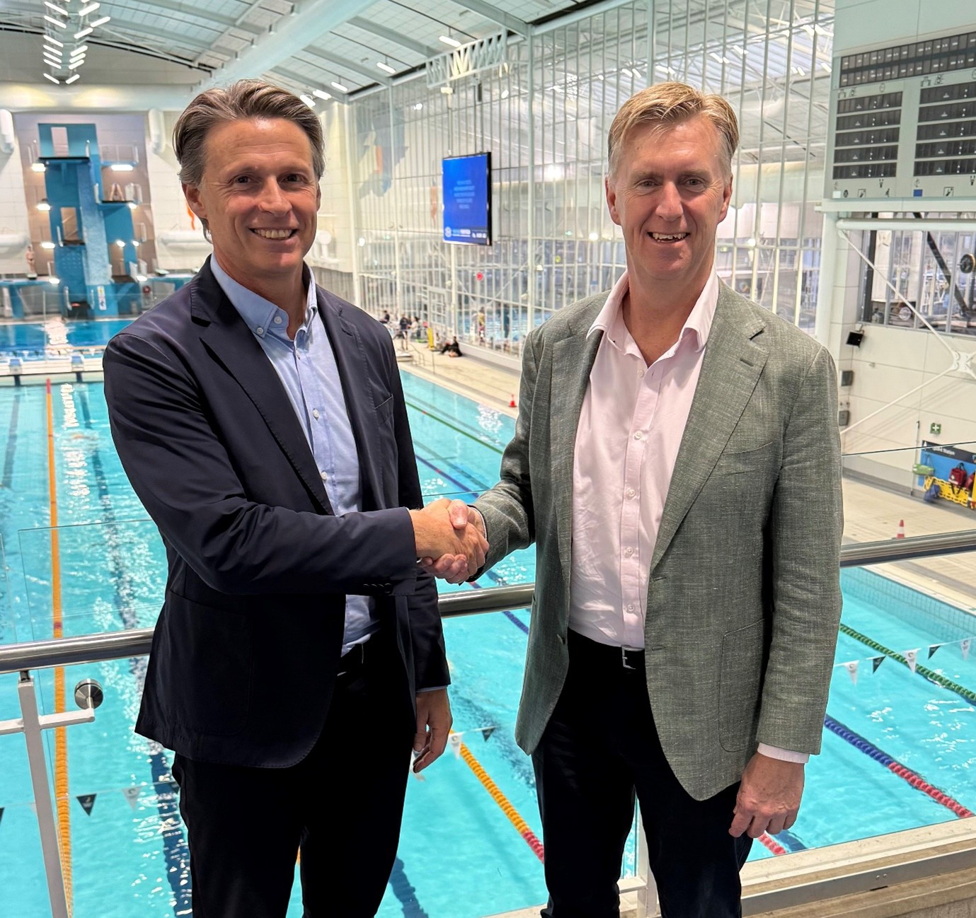 Royal Life Saving Australia CEO Justin Scarr and Rob Woodhouse CEO Swimming Australia