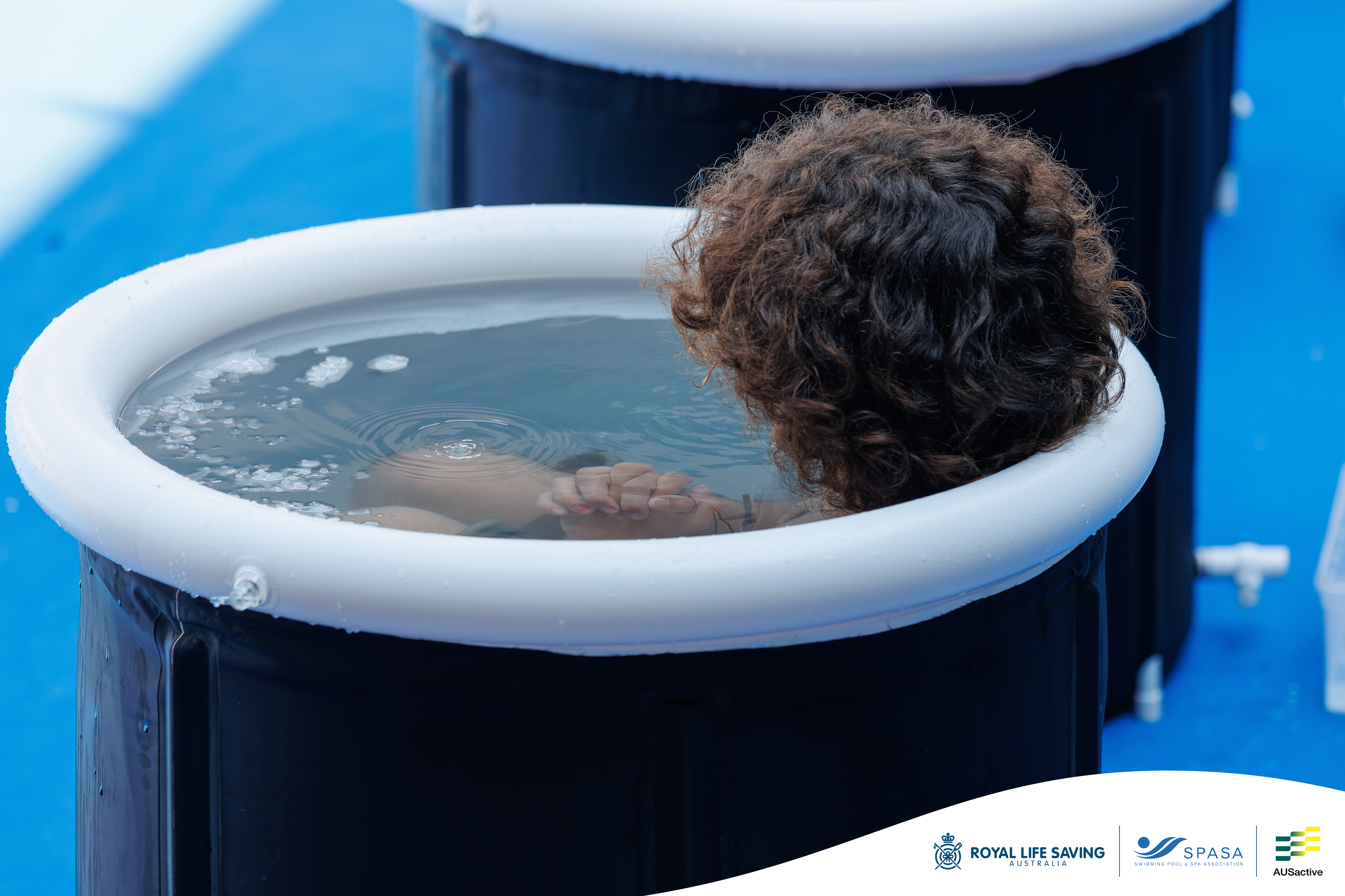 person in portable ice bath